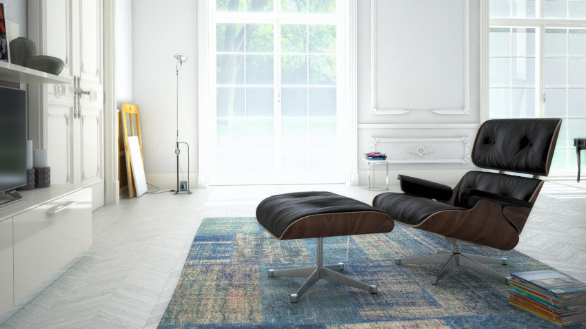 Eames Lounge Chair von Vitra in einem lichtdurchfluteten Altbau